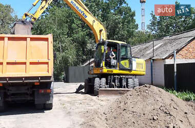 Колесный экскаватор Komatsu PW 2004 в 