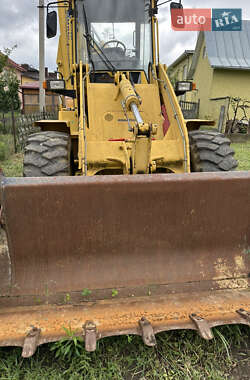 Экскаватор погрузчик Komatsu WB 2005 в 