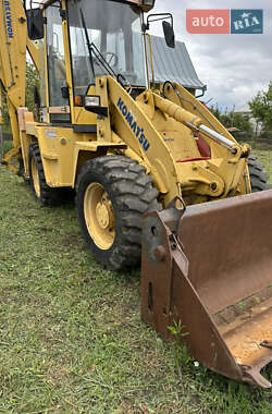 Экскаватор погрузчик Komatsu WB 2005 в 
