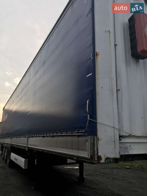 Бортовий напівпричіп Krone SAF 2013 в Міжгір'ї