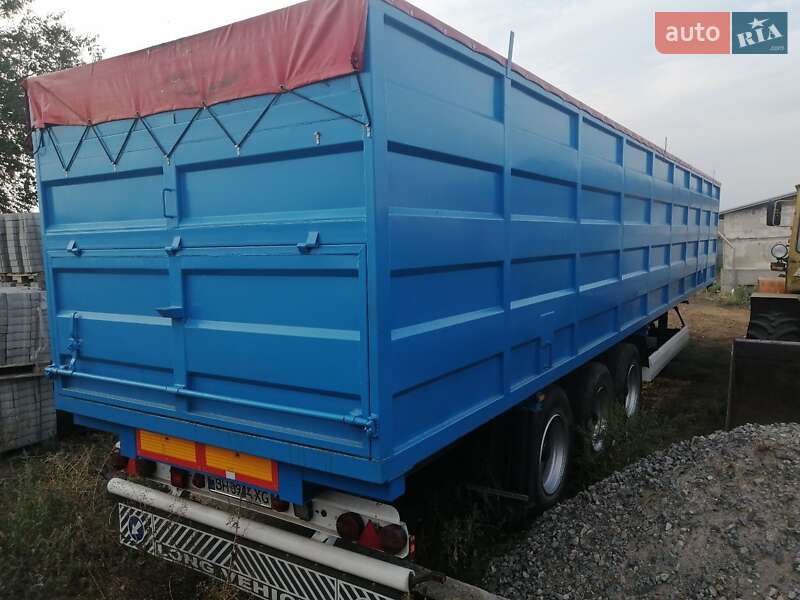 Бортовой полуприцеп Krone SD 27 2009 в Сарате