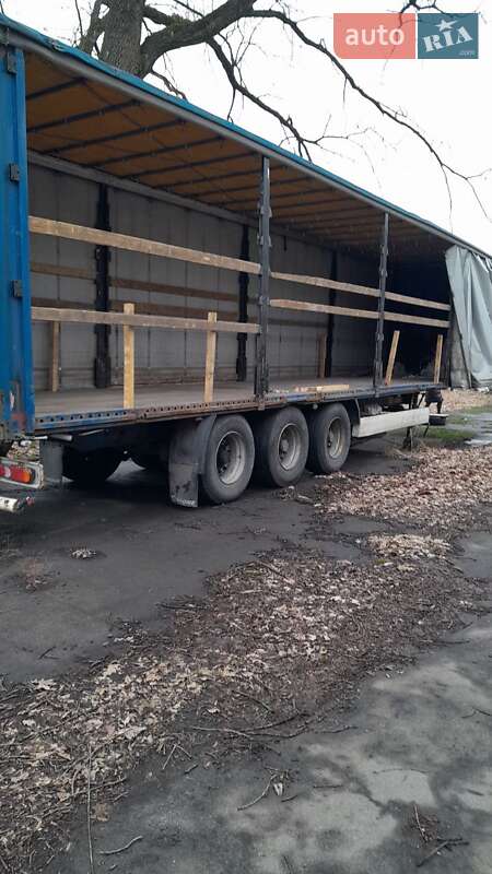 Тентованный борт (штора) - полуприцеп Krone SD 2007 в Сарнах фото Тентованный борт (штора) - полуприцеп Krone SD 2007 в Сарнах