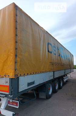 Тентованный борт (штора) - полуприцеп Krone SDP 27 2002 в 
