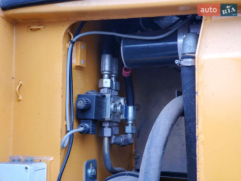 Колесный экскаватор Liebherr 312 2010 в Ровно