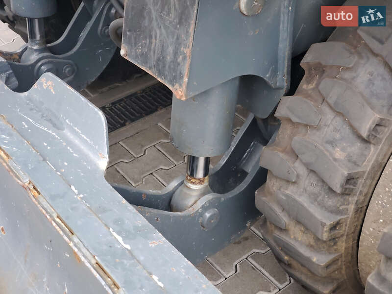 Колесный экскаватор Liebherr 312 2010 в Ровно