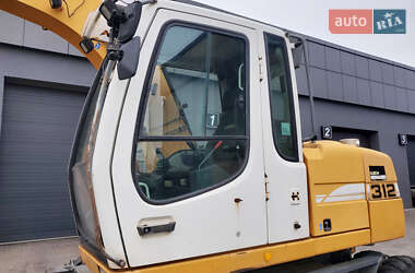 Колесный экскаватор Liebherr 312 2010 в 