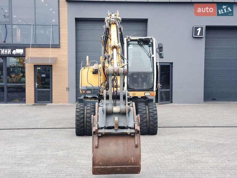 Колесный экскаватор Liebherr 312 2010 в Ровно