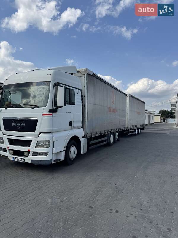 Тентованый MAN TGX 2009 в 