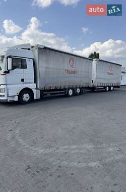 Тентованый MAN TGX 2009 в 
