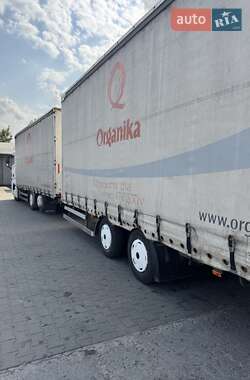 Тентованый MAN TGX 2009 в 