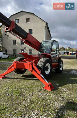 Телескопічні навантажувачі Manitou 1232 S 1997 в 