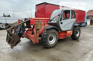 Телескопічні навантажувачі Manitou МТ 1435 2011 в 