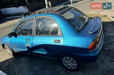 Седан Mazda 121 1992 в 