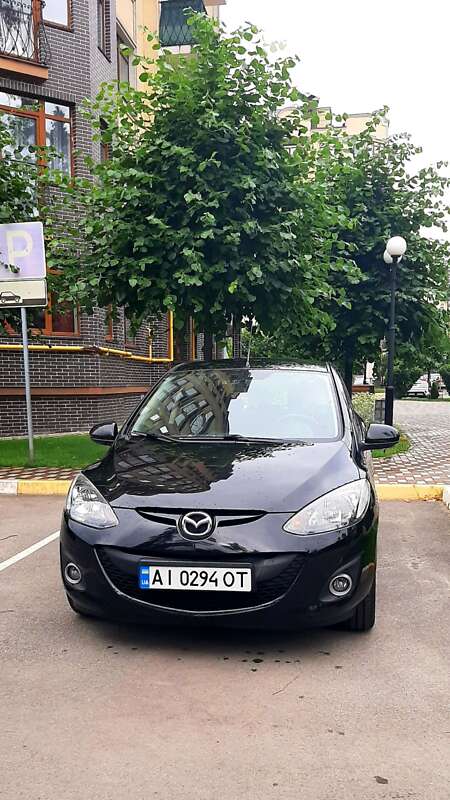 2011 Mazda 2, VIN JMZDEA4K210451392:plate — фото 1 (autoria)