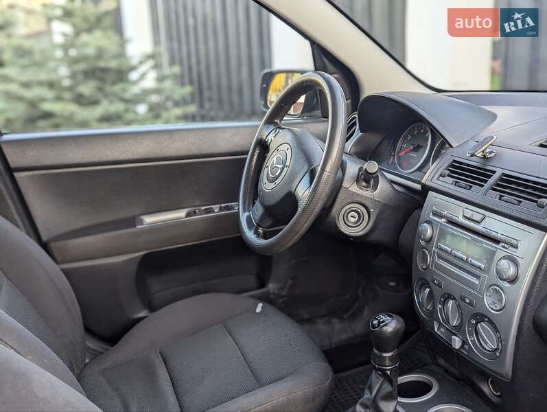 Хэтчбек Mazda 2 2007 в Каменском фото 11 Хэтчбек Mazda 2 2007 в Каменском
