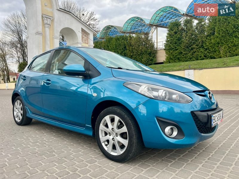 2011 Mazda 2, VIN JMZDEA4J200438516:plate — фото 1 (autoria)