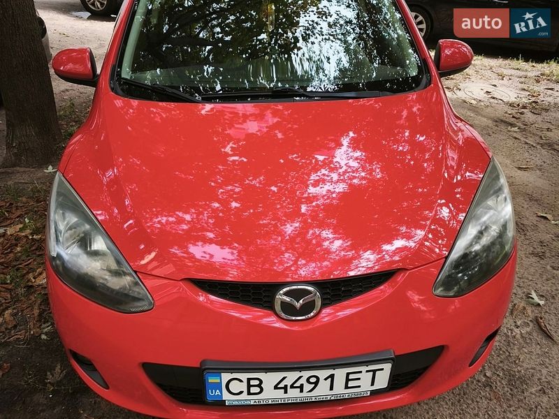 2009 Mazda 2, VIN JMZDE145500212999:plate — фото 1 (autoria)