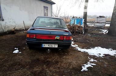 Седан Mazda 323 1990 в Барышевке
