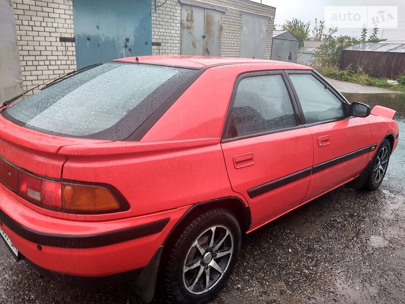 Хэтчбек Mazda 323 1994 в Кременчуге фото 14 Хэтчбек Mazda 323 1994 в Кременчуге