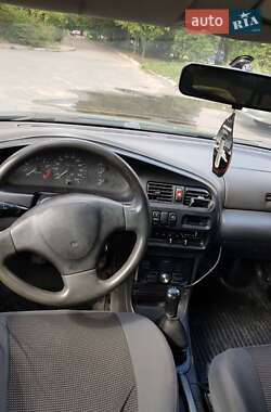 Седан Mazda 323 1996 в Ирпене