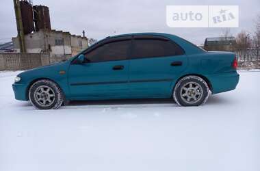 Седан Mazda 323 1996 в 