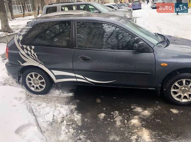 Седан Mazda 323 1998 в Гостомеле