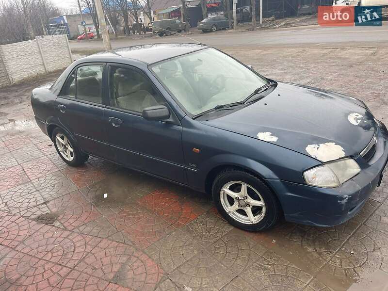 Седан Mazda 323 1999 в 