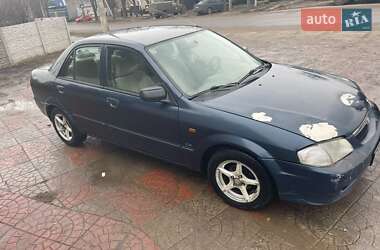 Седан Mazda 323 1999 в 