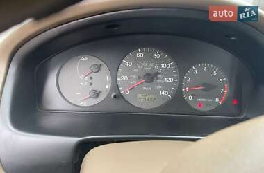 Седан Mazda 323 1999 в 