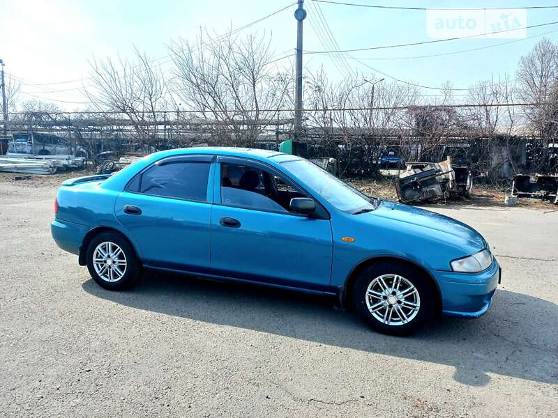 Седан Mazda 323 1998 в Одесі фото 7 Седан Mazda 323 1998 в Одесі