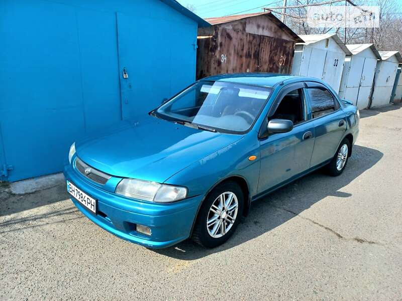 Седан Mazda 323 1998 в Одесі фото 12 Седан Mazda 323 1998 в Одесі