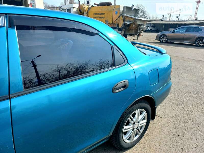 Седан Mazda 323 1998 в Одесі фото 21 Седан Mazda 323 1998 в Одесі