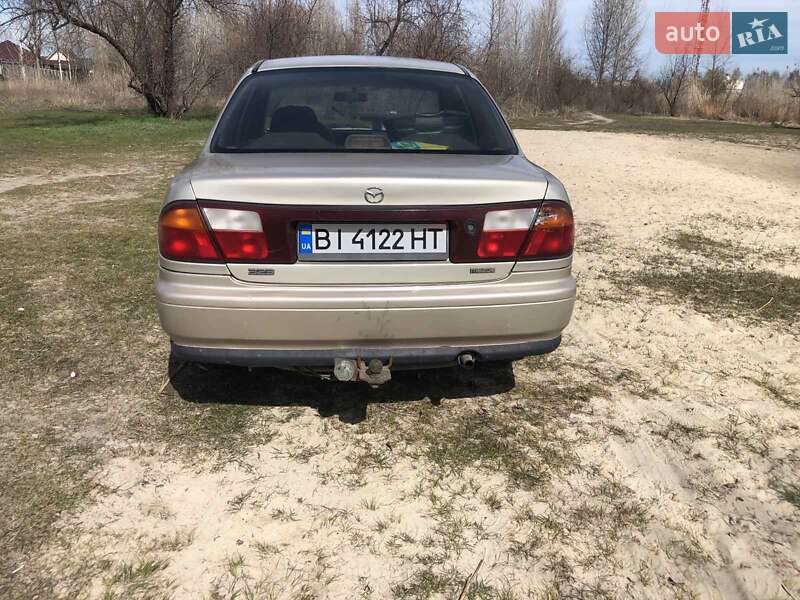 Седан Mazda 323 1998 в Кременчуге фото 6 Седан Mazda 323 1998 в Кременчуге