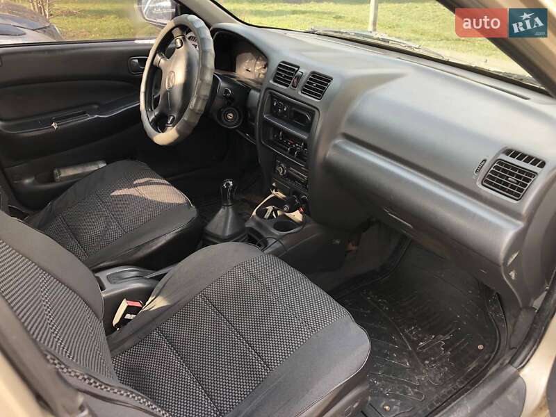 Седан Mazda 323 1998 в Кременчуге