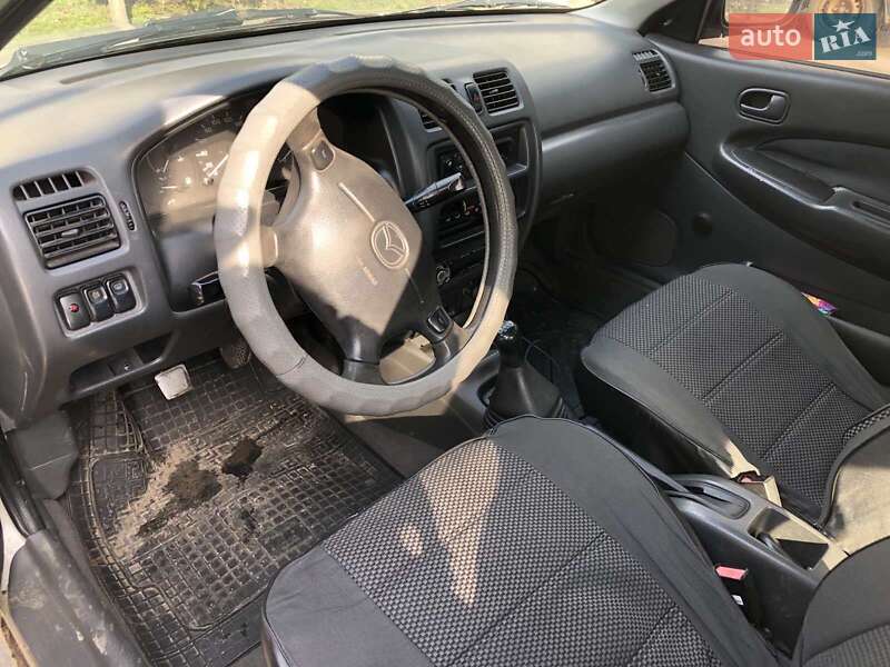 Седан Mazda 323 1998 в Кременчуге фото 9 Седан Mazda 323 1998 в Кременчуге