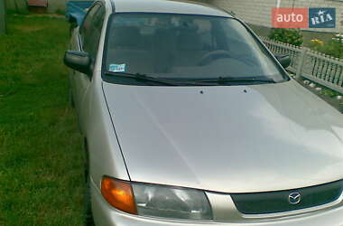 Седан Mazda 323 1996 в 