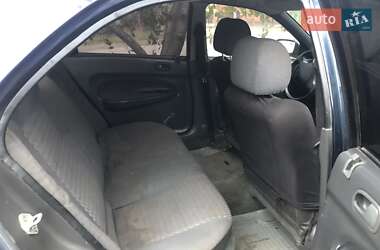 Седан Mazda 323 1996 в 