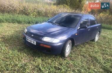 Седан Mazda 323 1996 в 