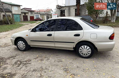 Седан Mazda 323 1996 в Буске