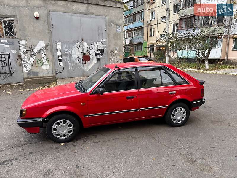 Хэтчбек Mazda 323 1988 в Одессе фото 8 Хэтчбек Mazda 323 1988 в Одессе