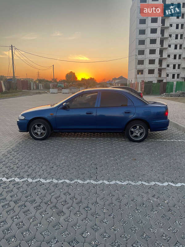 Седан Mazda 323 1998 в Полтаве