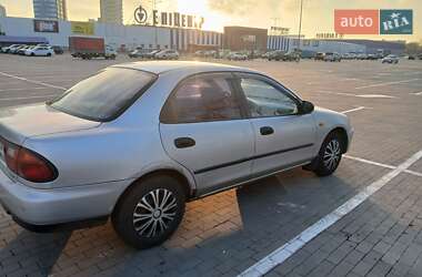 Седан Mazda 323 1996 в 