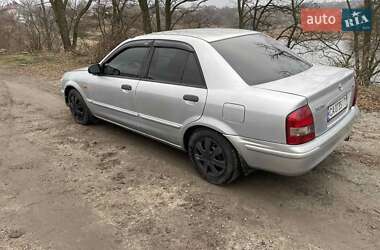 Седан Mazda 323 1999 в Білій Церкві