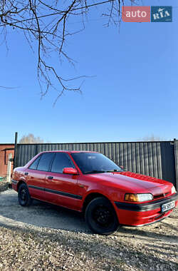 Седан Mazda 323 1992 в Вараші