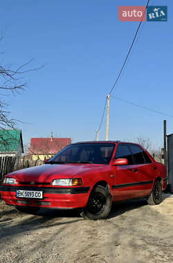 Седан Mazda 323 1992 в Вараше