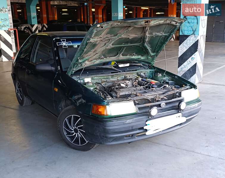 Хэтчбек Mazda 323 1992 в Киеве фото 9 Хэтчбек Mazda 323 1992 в Киеве