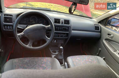 Седан Mazda 323 1997 в 