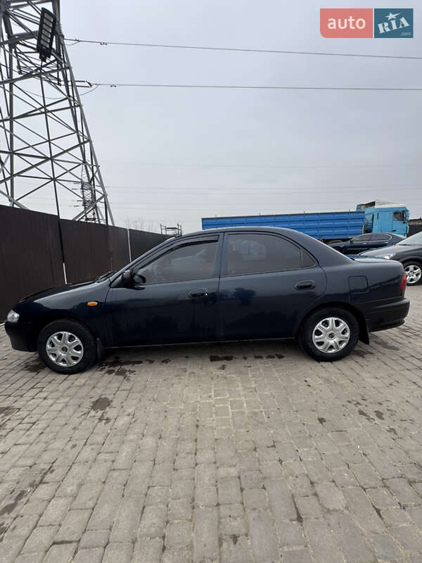 Седан Mazda 323 1997 в Одессе фото 7 Седан Mazda 323 1997 в Одессе