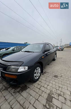 Седан Mazda 323 1997 в 