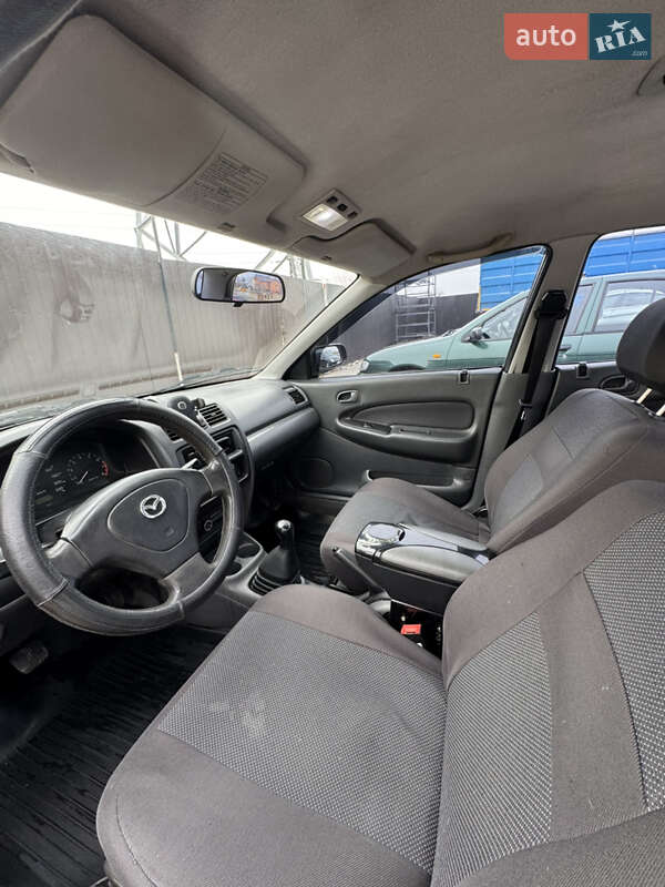 Седан Mazda 323 1997 в Одессе фото 23 Седан Mazda 323 1997 в Одессе